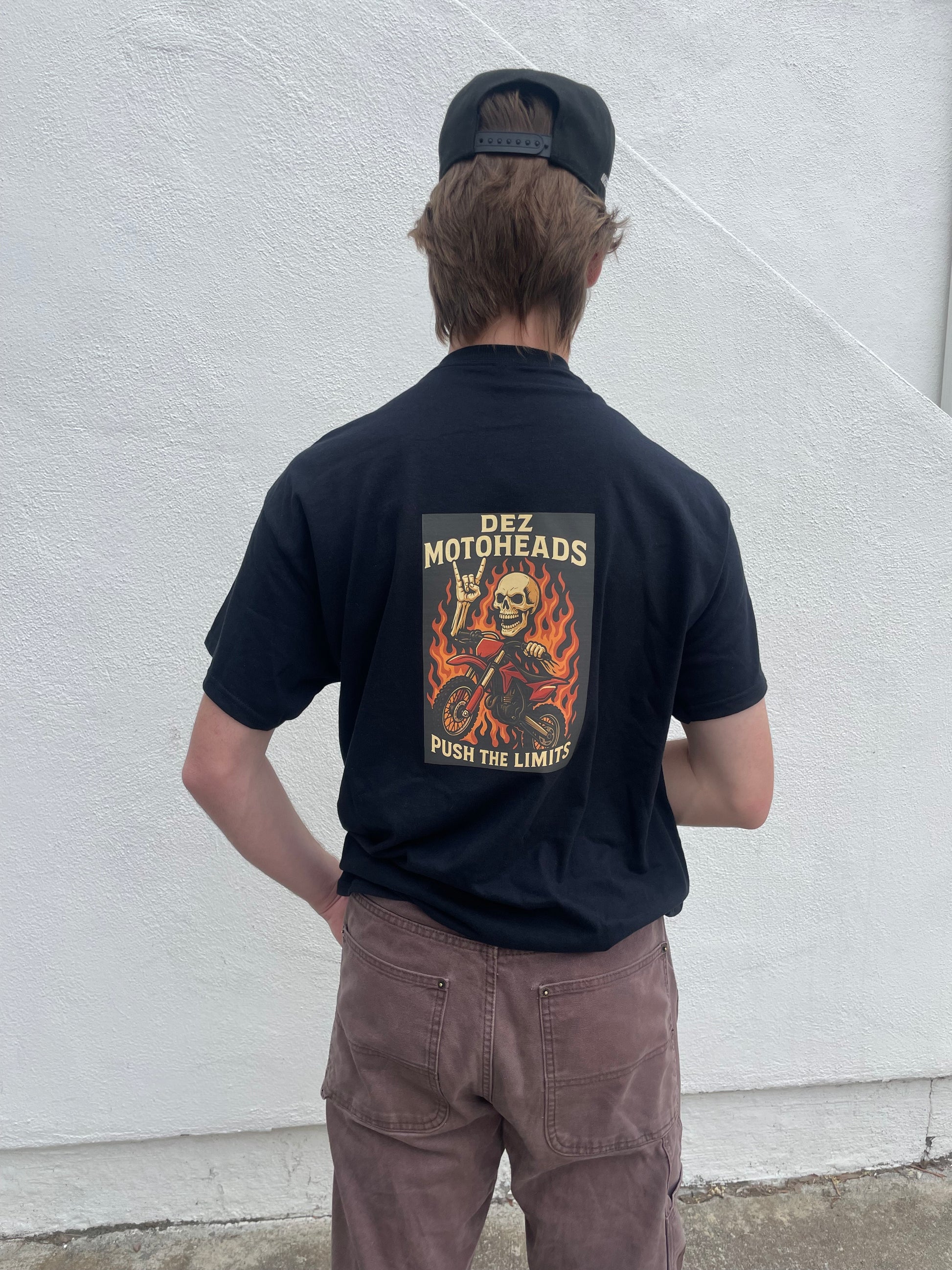 Skull dirt bike rider with orange flames
